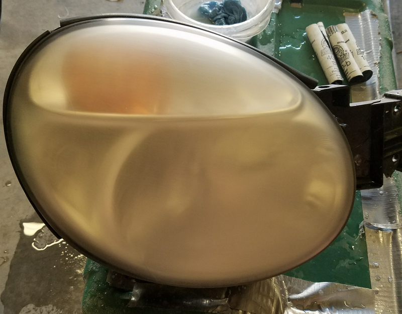 after 400 grit sandpaper. always a little nerve wracking when you get to this point because your headlights are well and truly ruined!